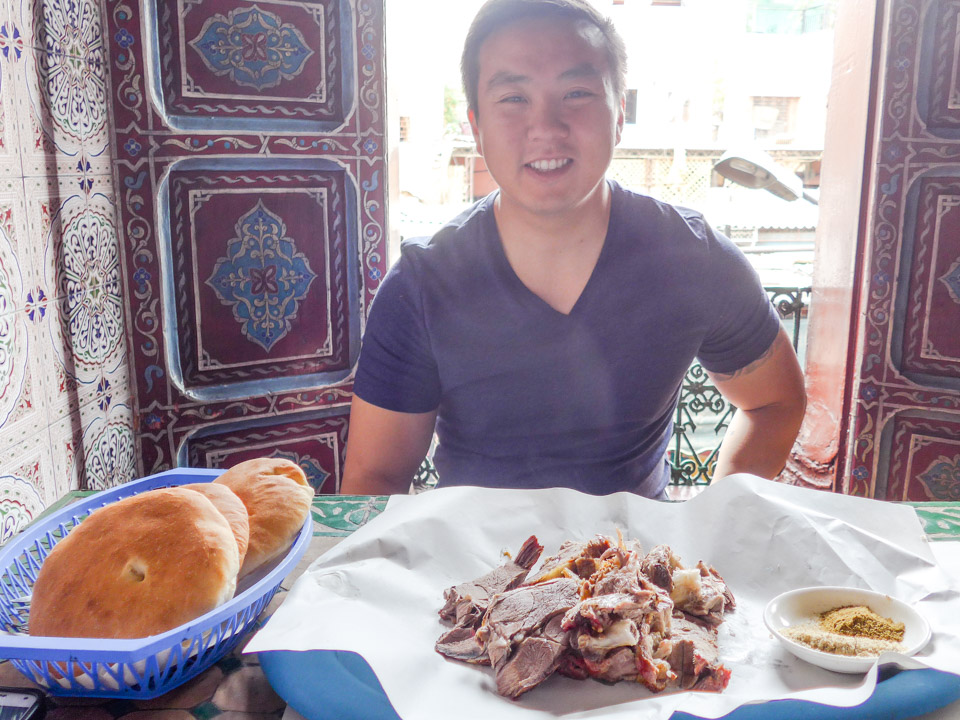 Eating mechoui in Marrakech